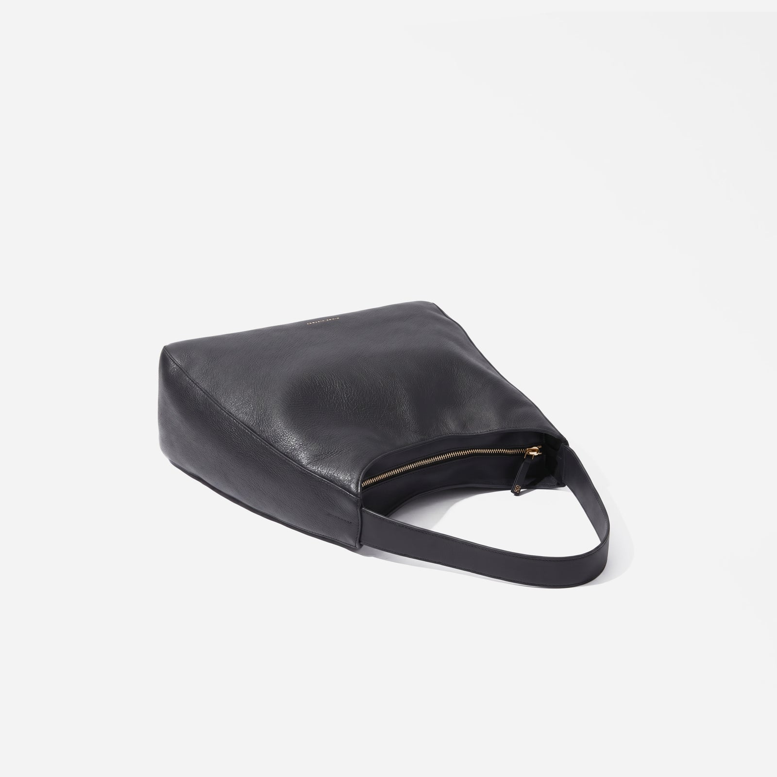 The Overtime Lite flat lay showing its soft slouchy shape -Black