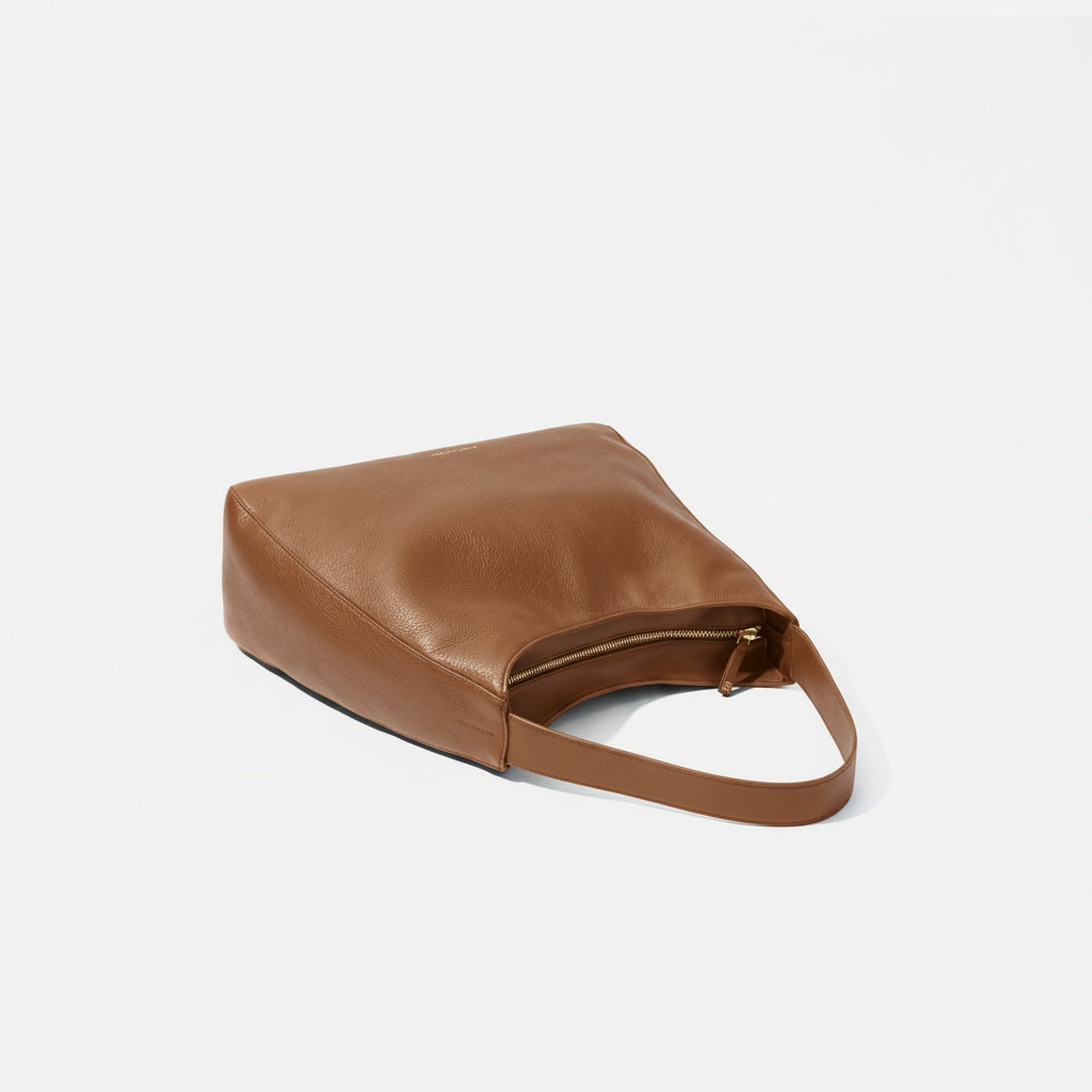 The Overtime Lite flat lay showing its soft slouchy shape -Saddle