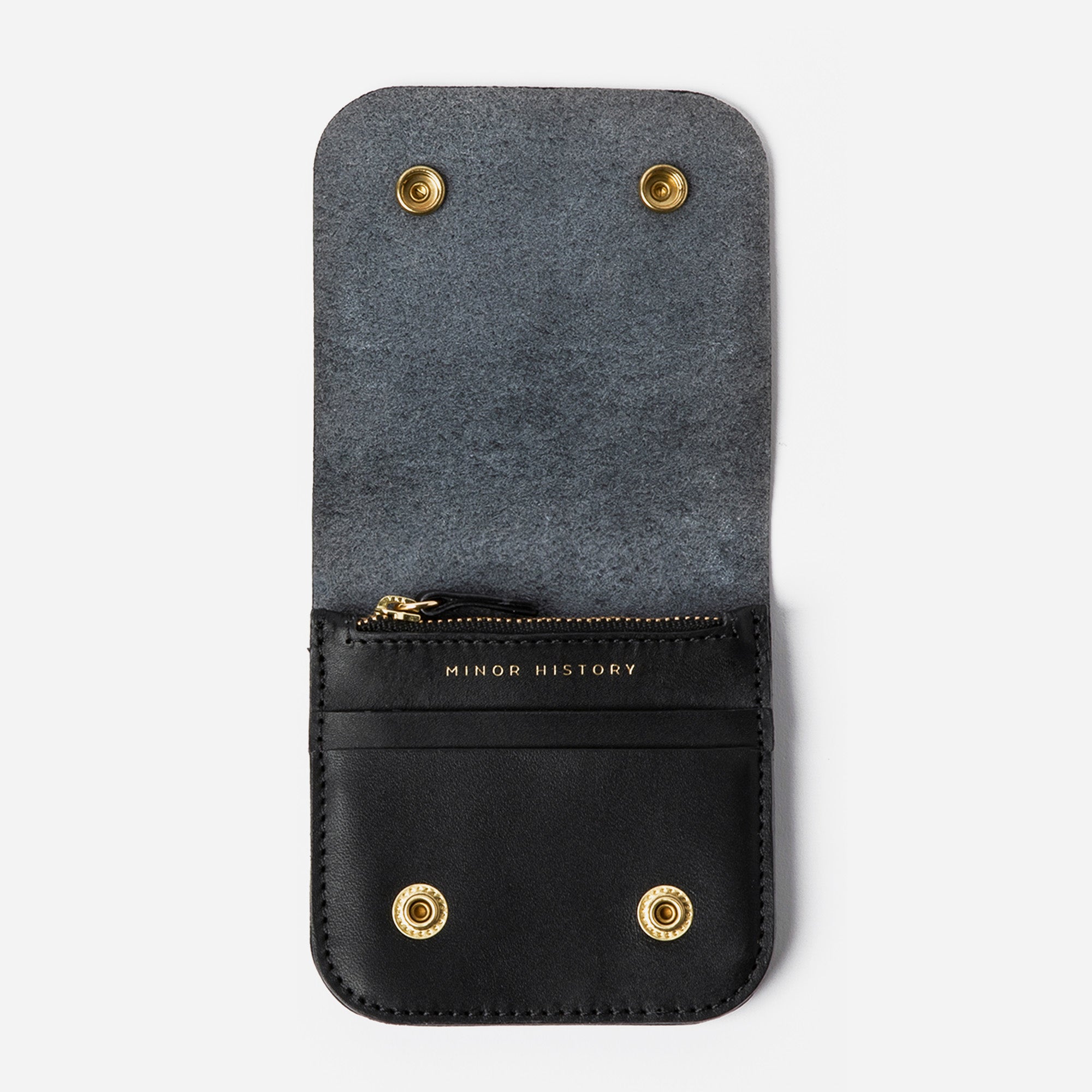Black leather pouch with gold studs on a white background - Black