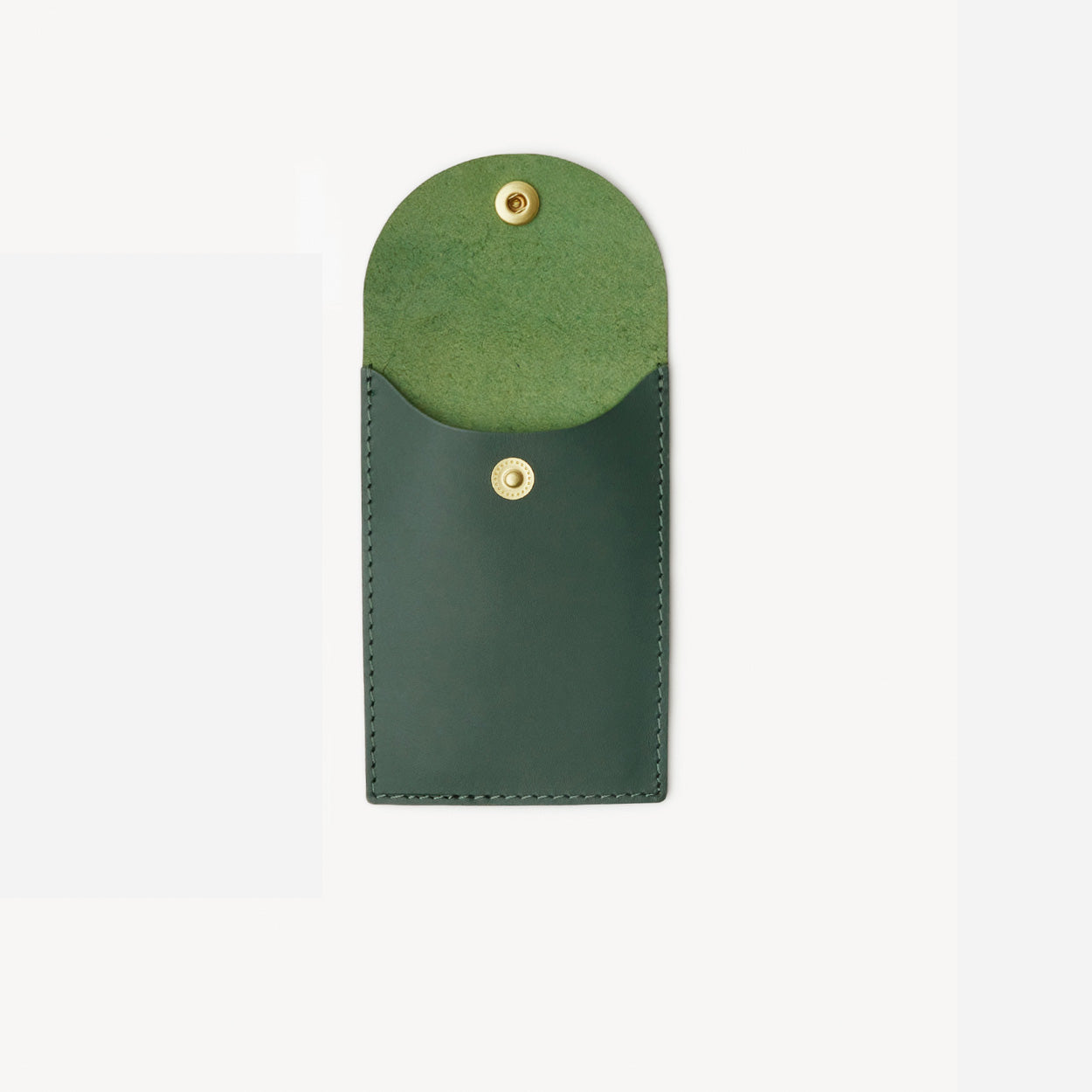 Green leather card holder with a gold button on a white background - Evergreen
