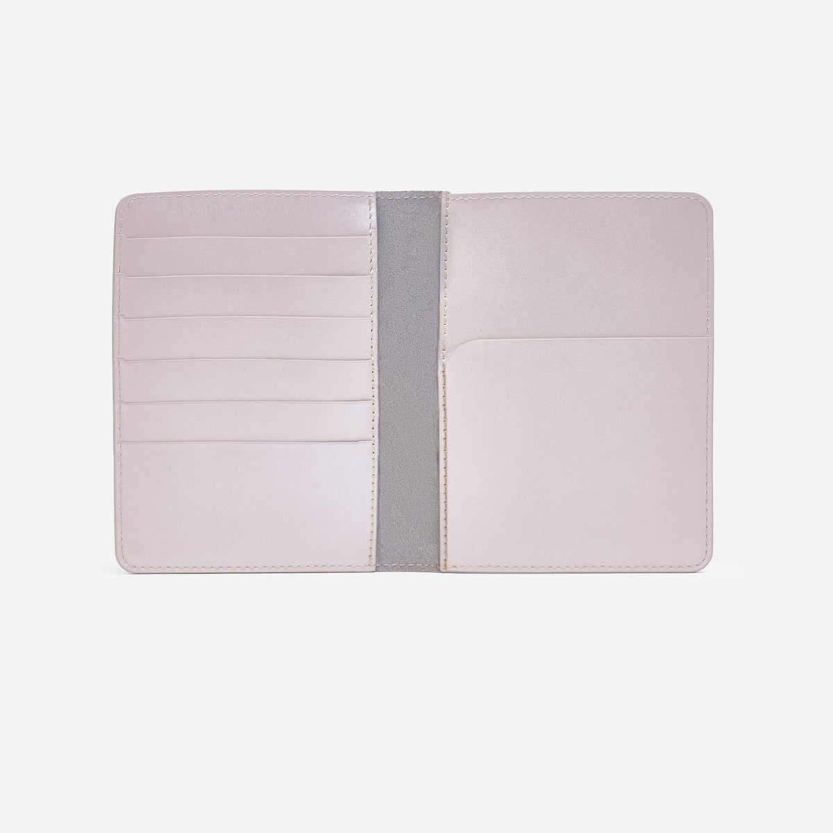 Atlas passport holder in pearl white full-grain leather, front view in bright studio setting - Pearl