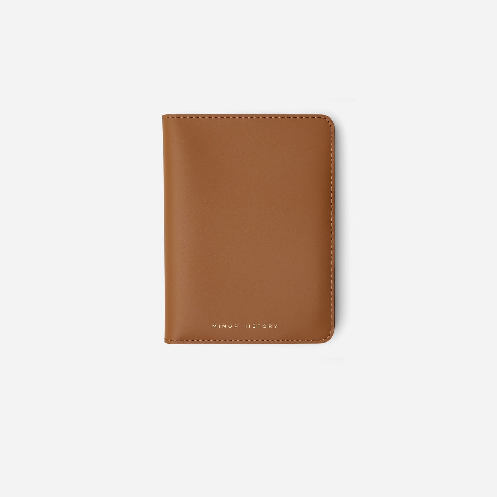 Atlas passport holder in black full-grain leather, side view highlighting slim profile - Black