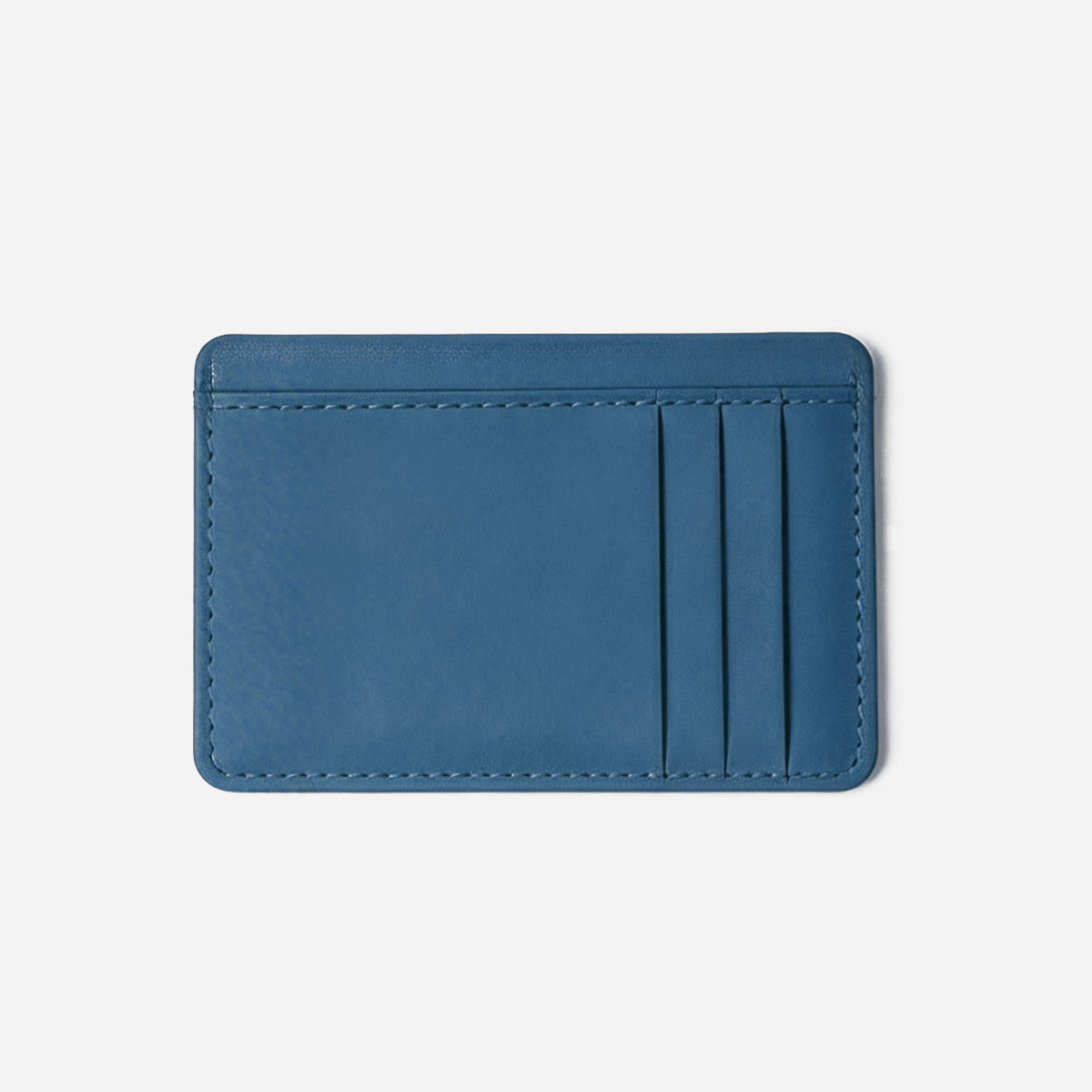 Blue cardholder on a light gray background - Chambray