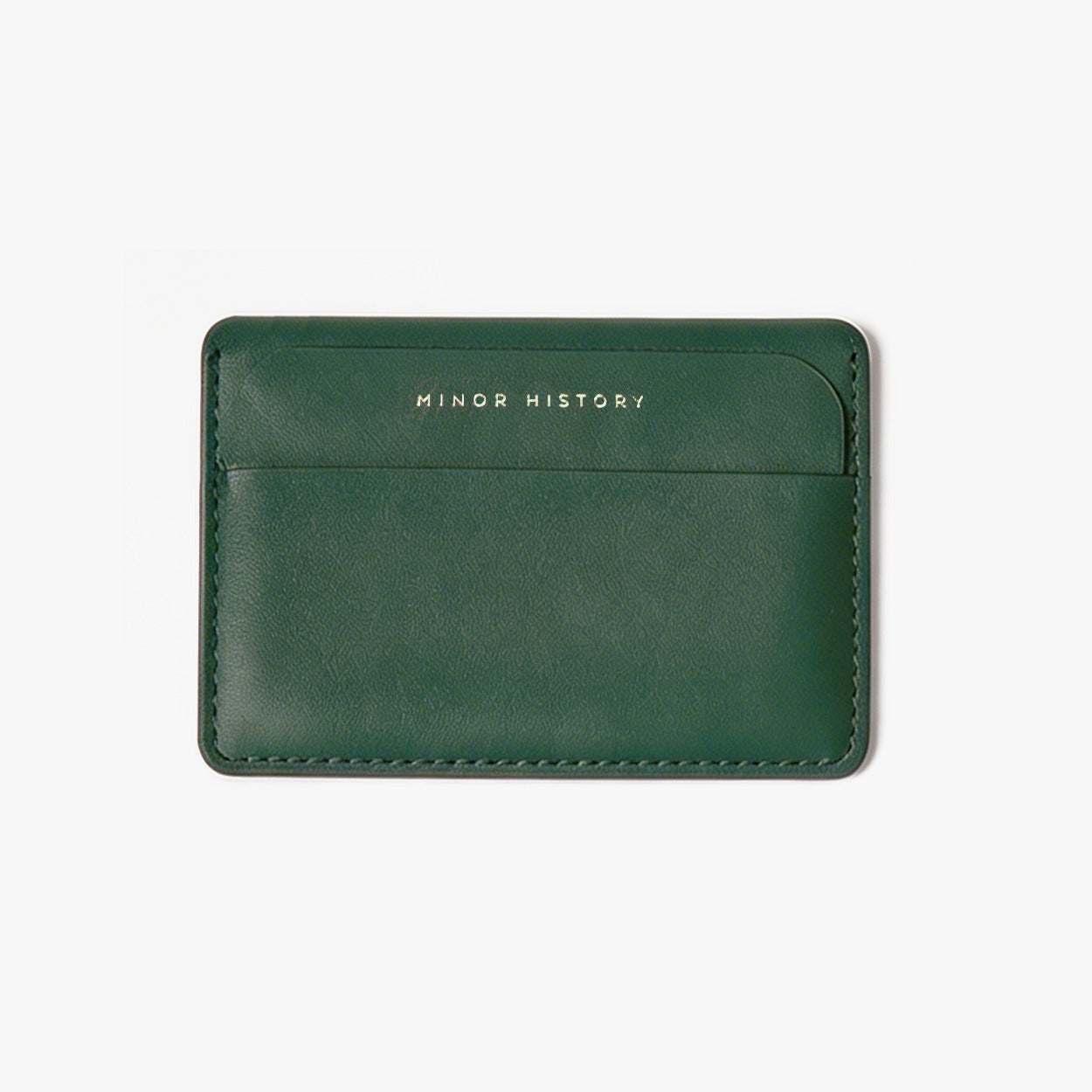 Gold cardholder with 'Ninety History' branding on a white background - Golden