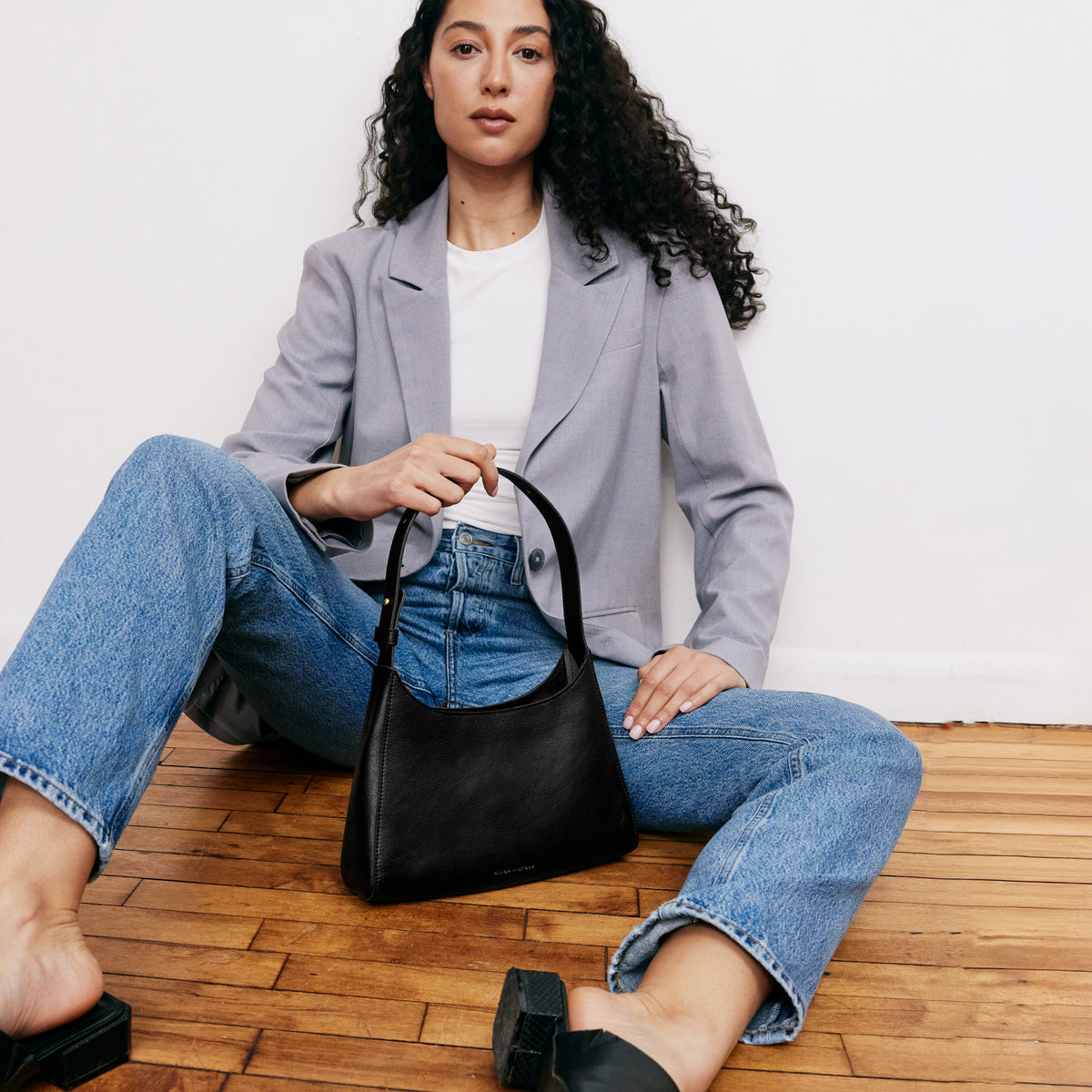 Lifestyle photo of Overtime Tote Bag styled for everyday carry - Black
