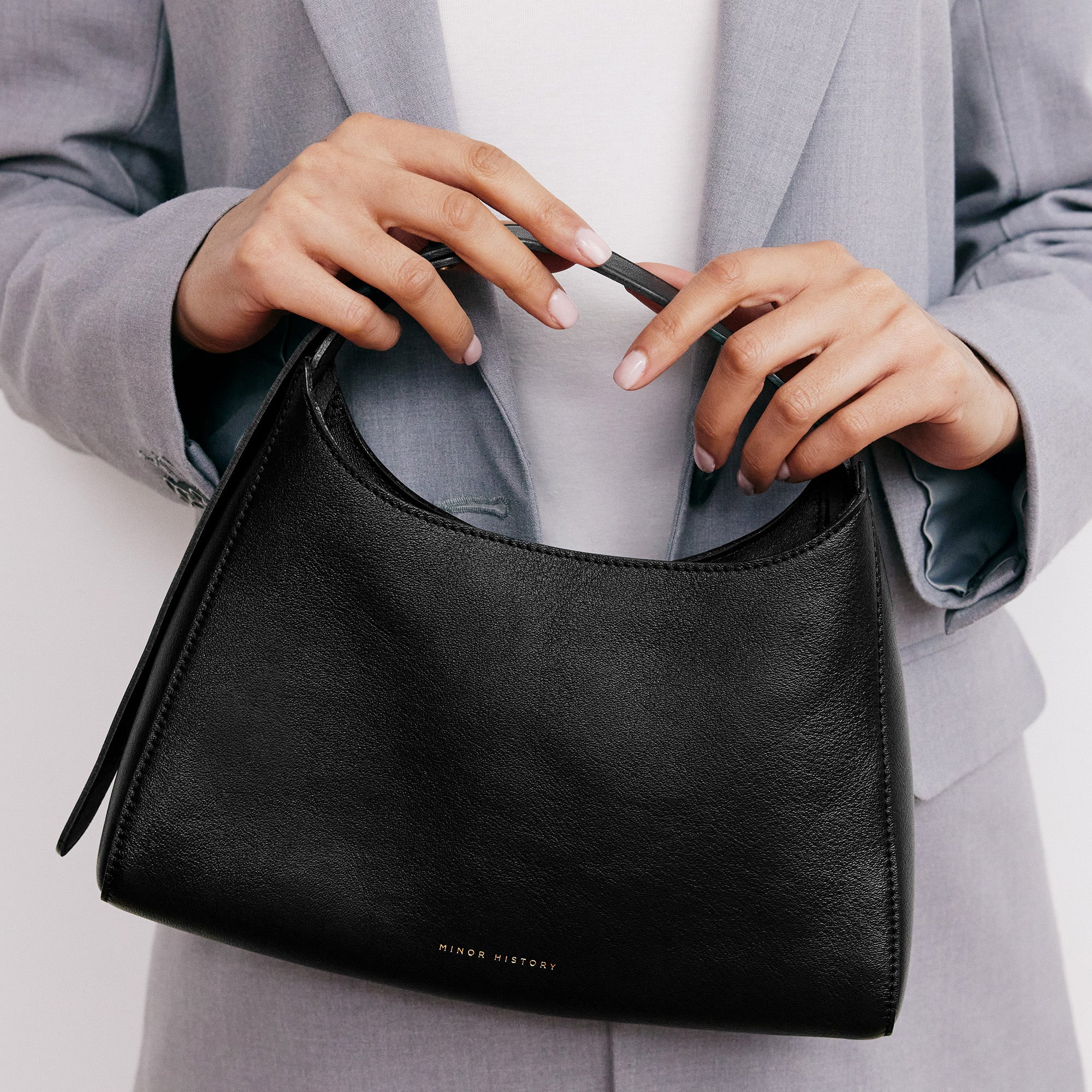 Black Overtime Tote Bag in premium full-grain leather with structured design - Black