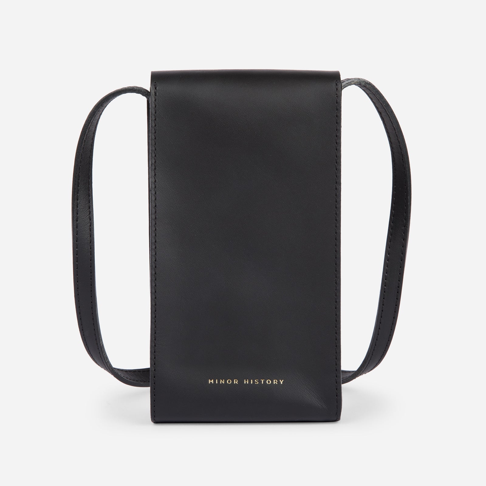 Mini Bandit crossbody bag in black full-grain leather, angled side view showing strap and shape - Black
