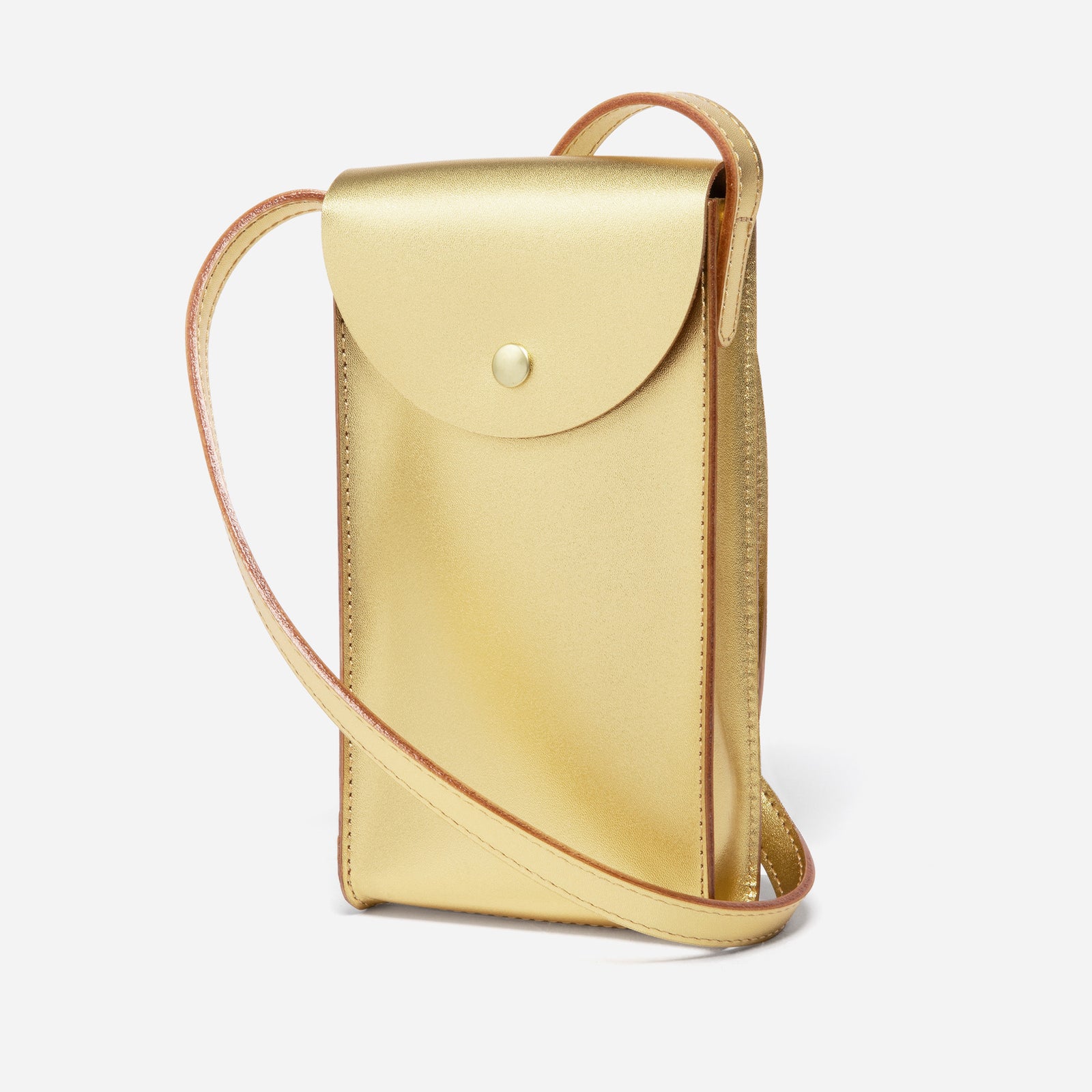 Mini Bandit crossbody bag in golden yellow full-grain leather, angled side view showing strap and shape  - Golden