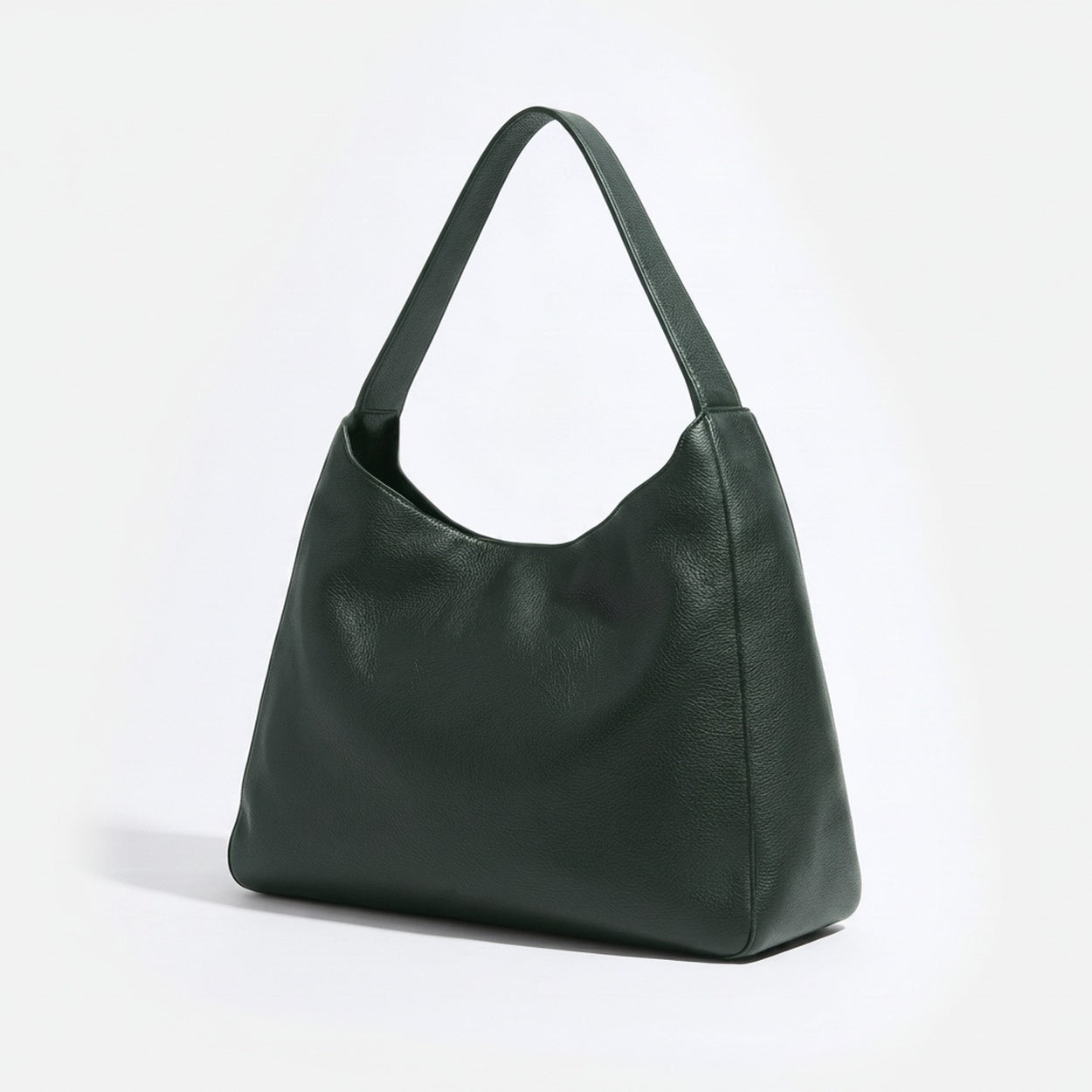 A dark green pebbled leather hobo shoulder bag with a single strap, shown on a clean white background. -Evergreen