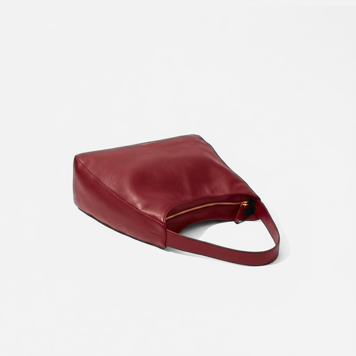 Red handbag on a light gray background -Cherry Cola