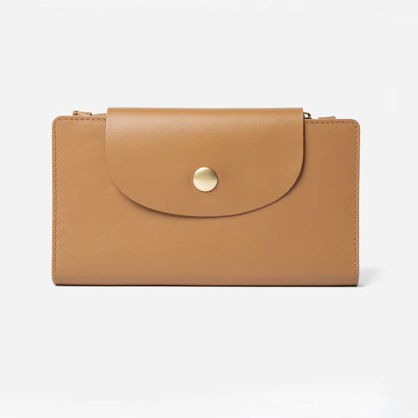 A black leather travel wallet with a snap closure and a gold-tone button. -Black