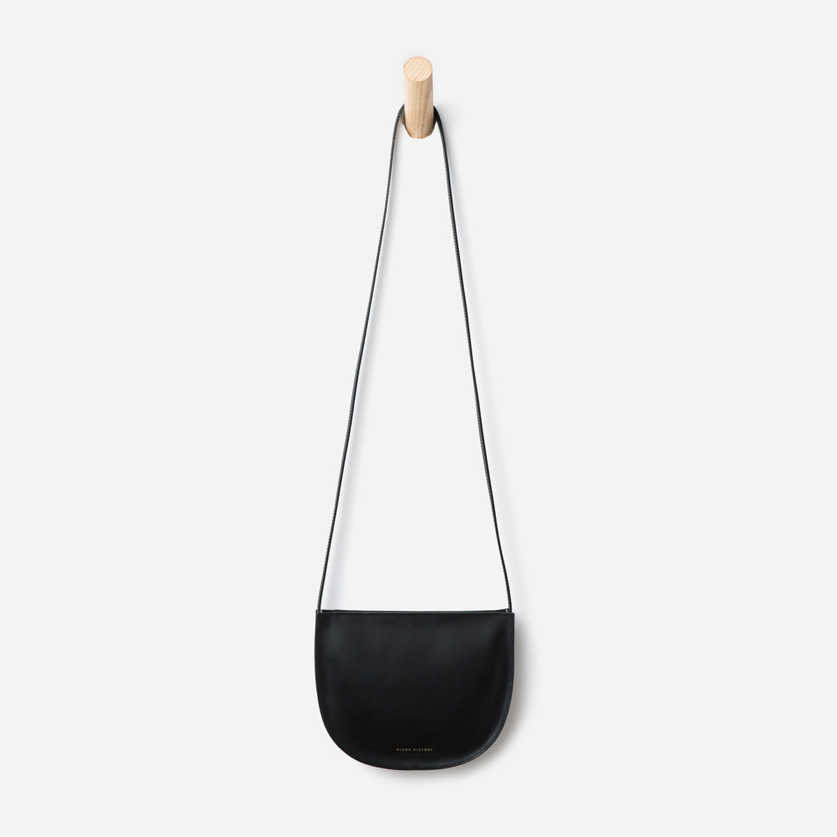 Close-up of Sidekick Crossbody bag in black leather - Black