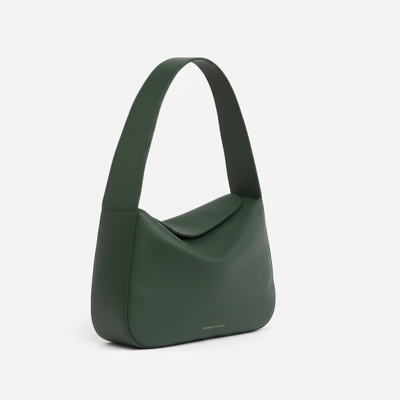Green handbag on a white background - Evergreen