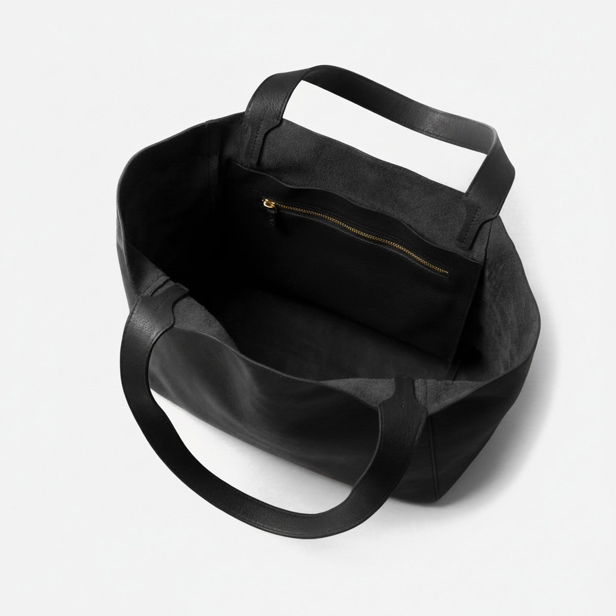 Black tote bag with a handle on a white background  - Black
