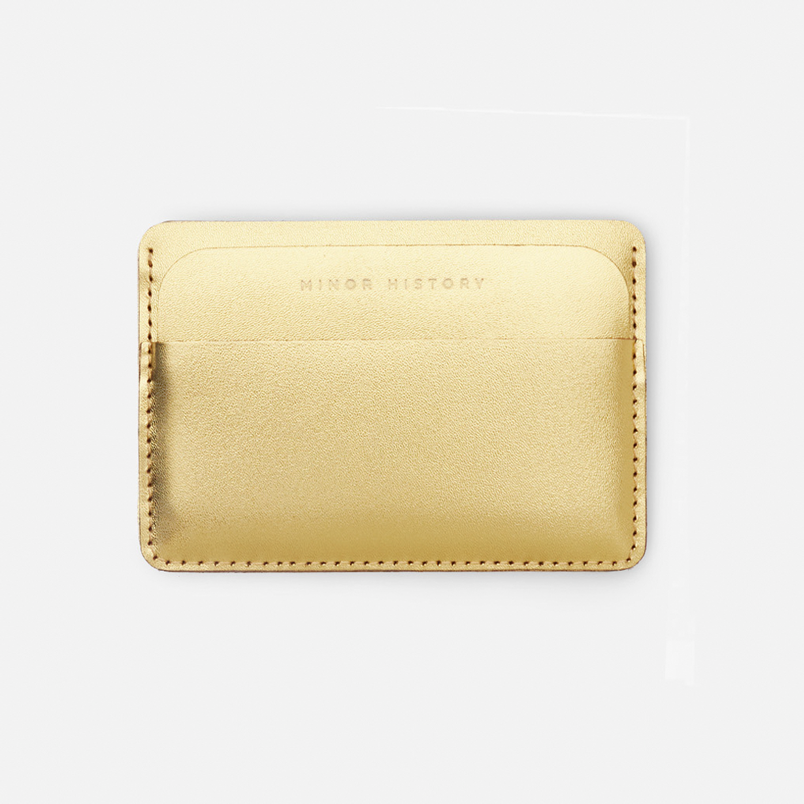 Gold cardholder with 'Ninety History' branding on a white background - Golden