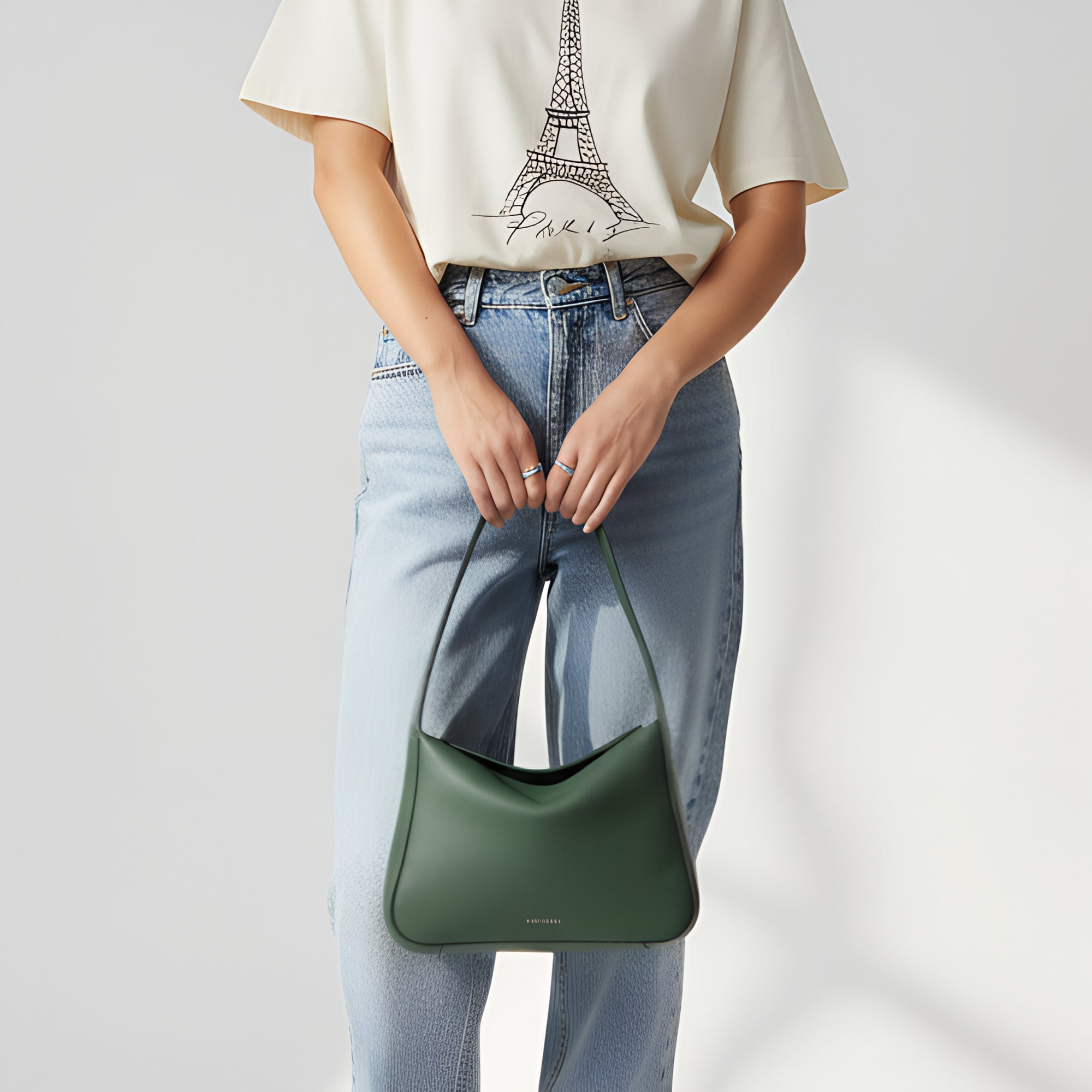 Frame Bag in luxury full-grain leather, styled as a shoulder bag with soft folds - Limelight