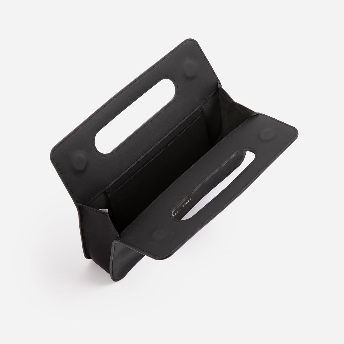 Minor History leather goods in styled flat lay with accessories  - Black