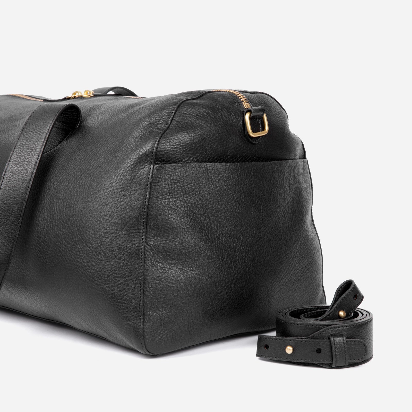 Close-up lifestyle image of leather handbags  - Black